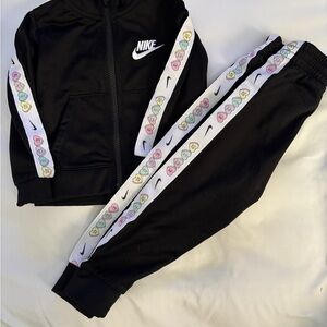 Nike Kids Black Joggers with Heart Details